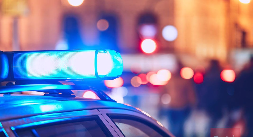 luces de coche de policia de noche